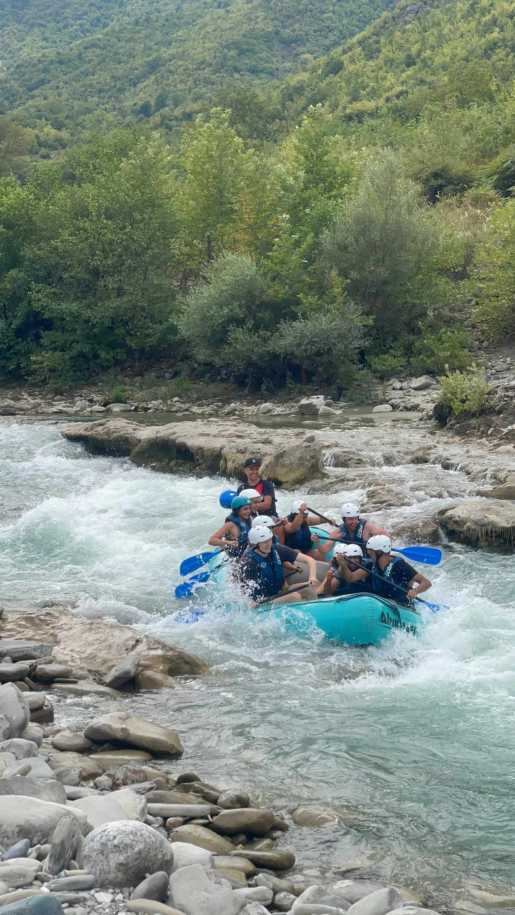 Group rafting through a lively stretch of the Vjosa
